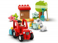 Landbouwtractor en dieren verzorgen